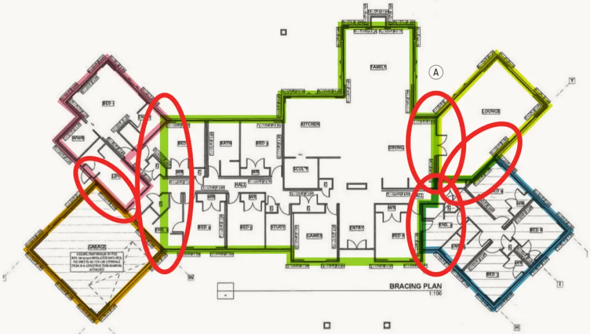A floorplan of a large house with areas separated by colour, there are red circles highlighting where the differently coloured areas are connected