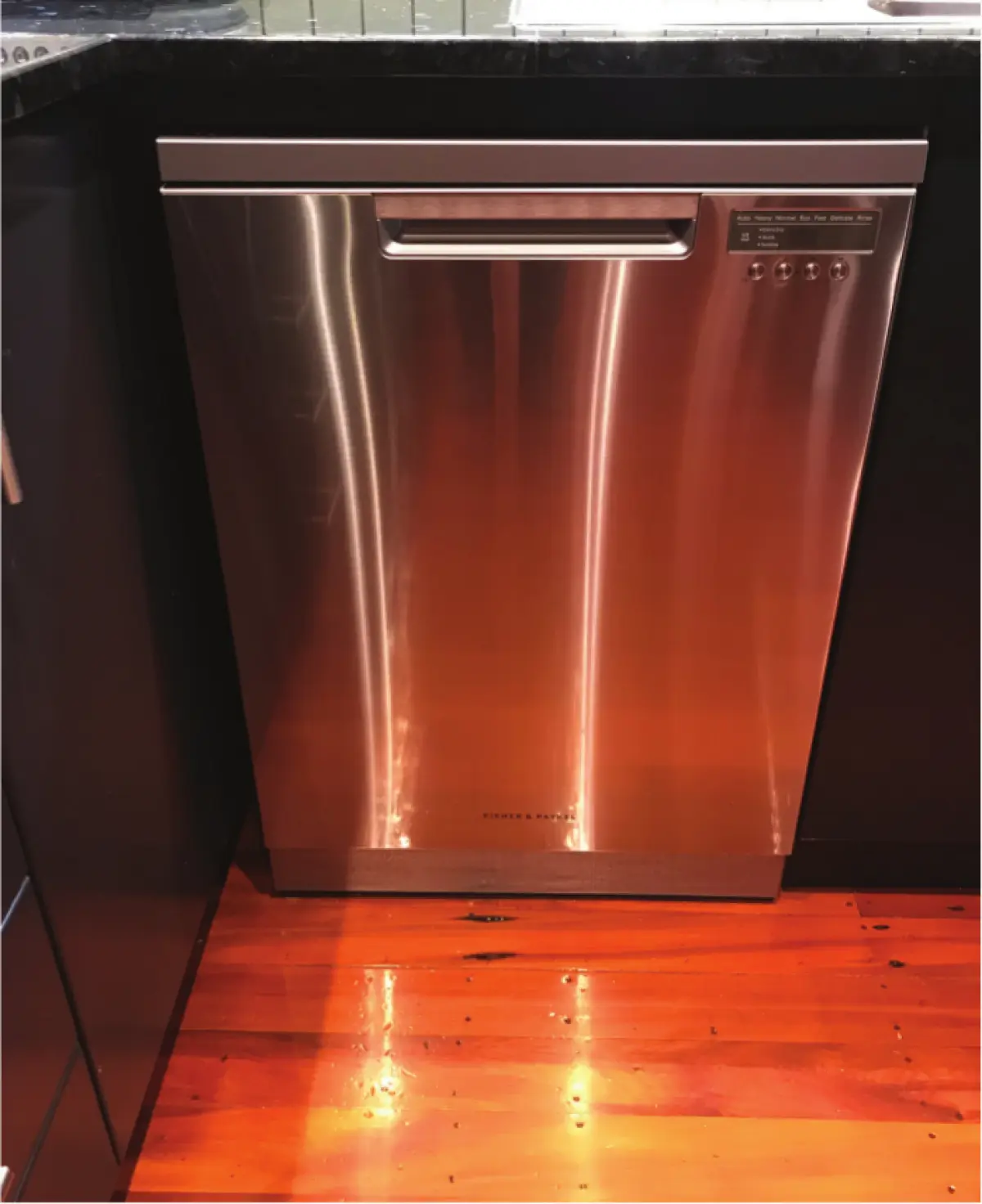 Photo showing dishwasher on a timber floor