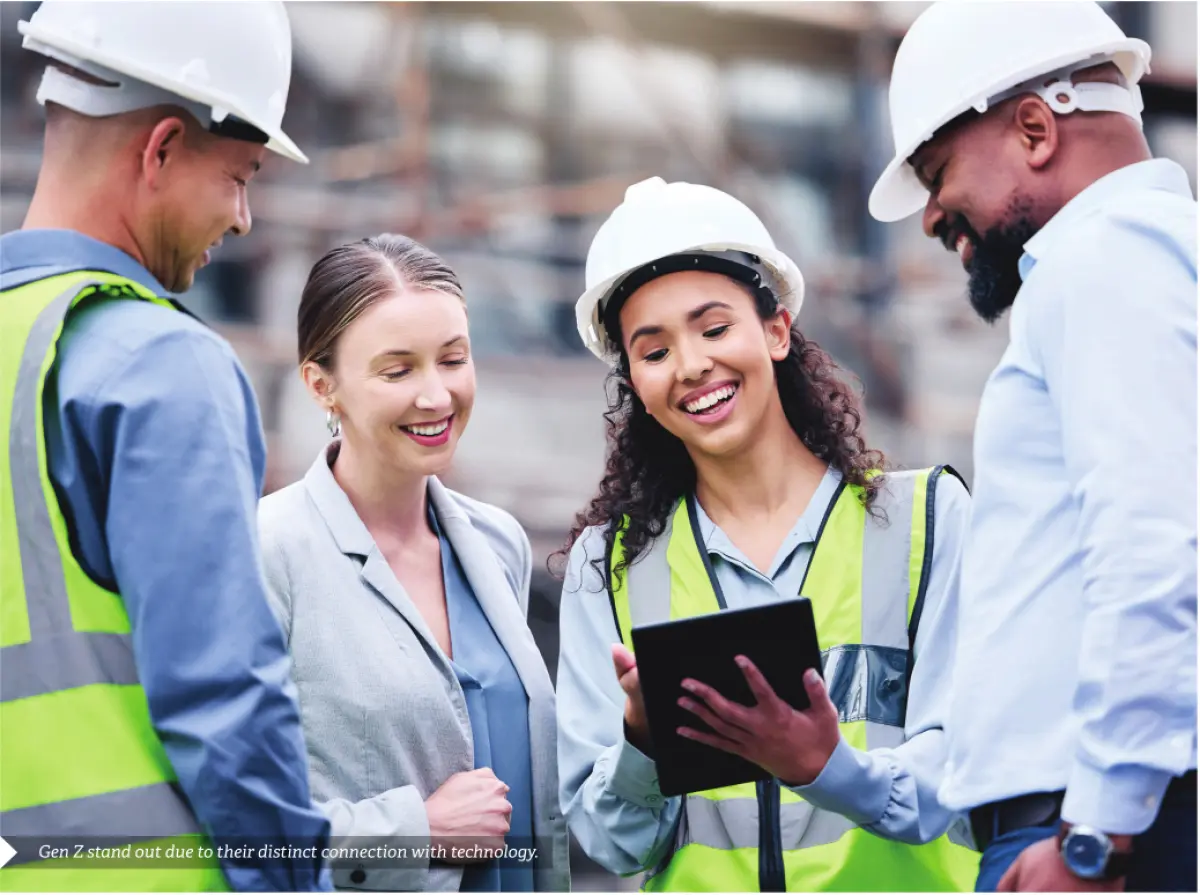 A photo of people in working attire looking at a tablet