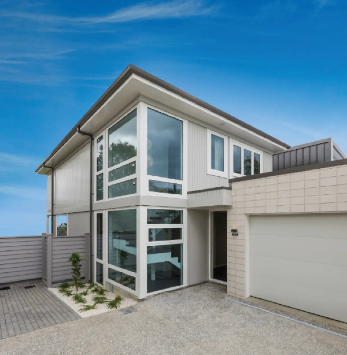 Another photo of a building with coated weatherboards