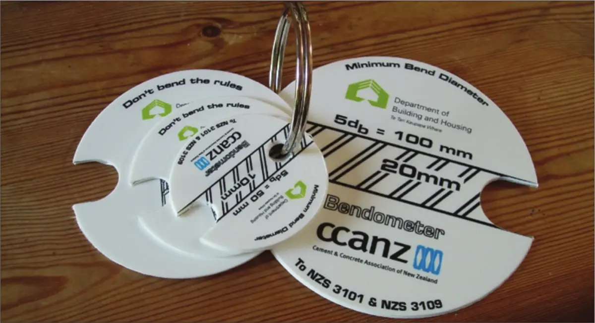A photo of Bendometer tools for checking the radius of bends on a key ring