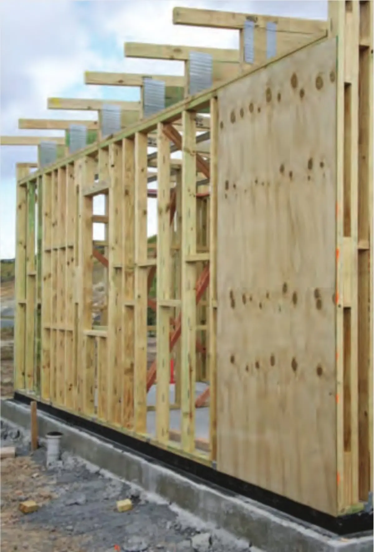 A photo of plywood being used as frame backing