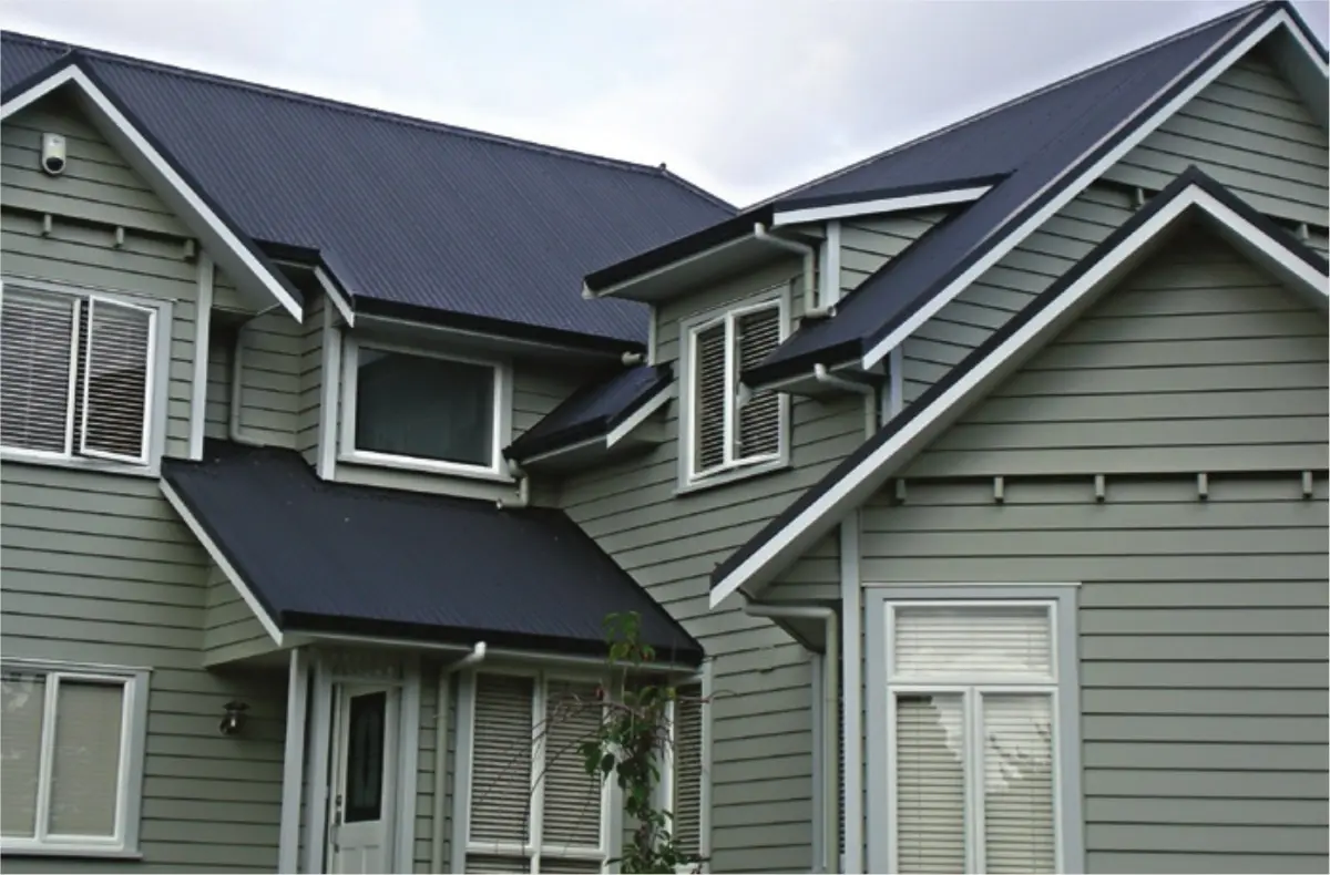 A photo of a house with angled roofing