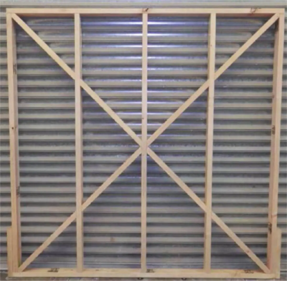 A photo of wooden bracings going vertically and diagonally