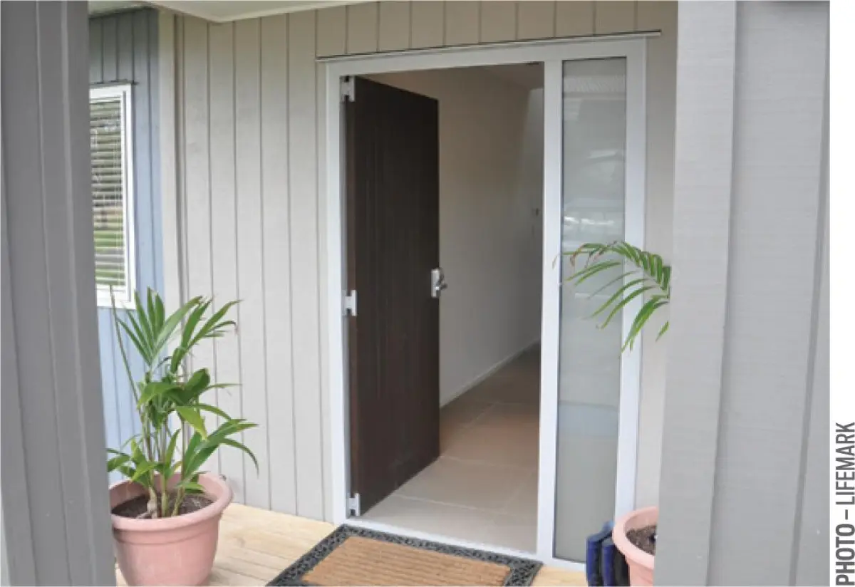 Photo of a doorway using a mat aid in accessability