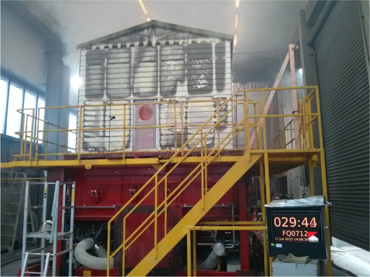 A picture of a house used in a laboratory fire test
