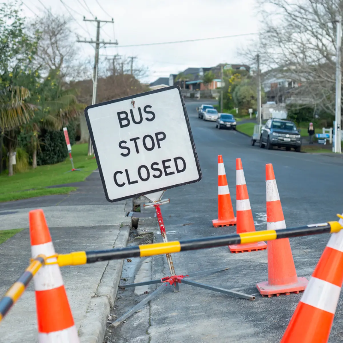 traffic cones surrounding closed bus stop