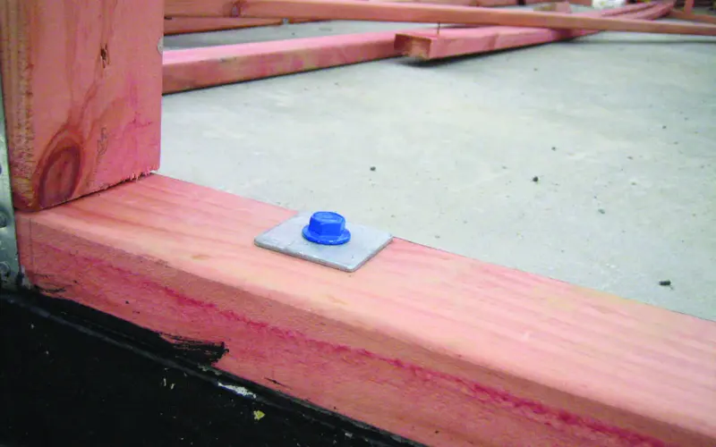Bottom plate structural fixings to concrete slabs