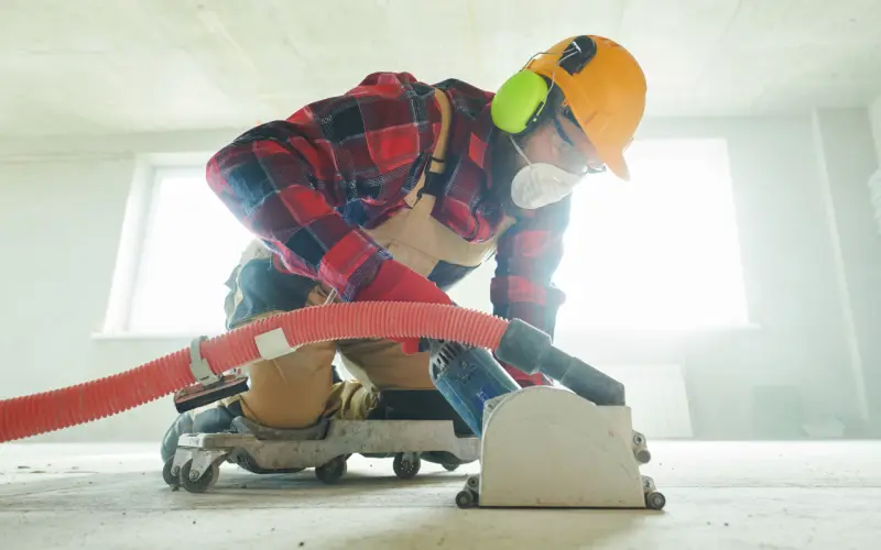 Cutting concrete to install a drain